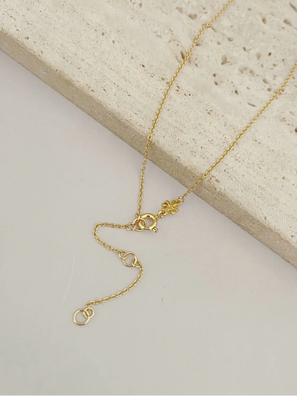 Tory Burch Gold-Tone Interlocking Circle Pendant with Crystal Accents